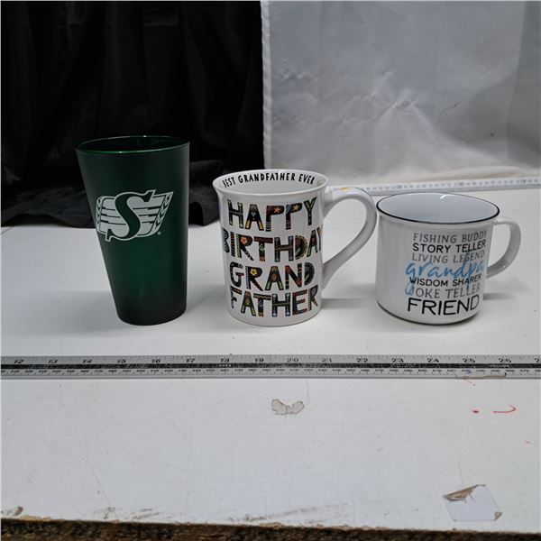 2 mugs and roughriders glass