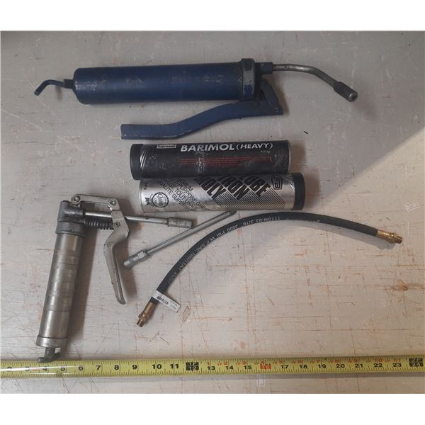 (2) Grease Guns and (2) Grease Roll.