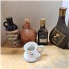 Image 1 : Various booze boittles and mug