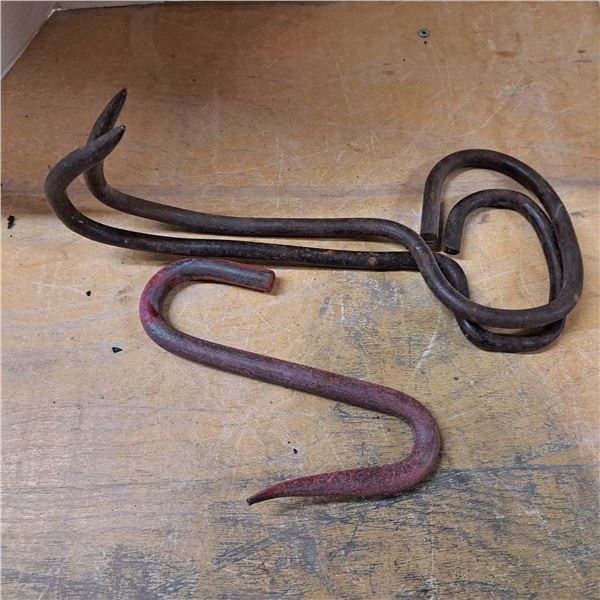 2 hay hooks and 1 meat hook