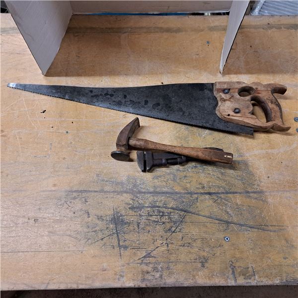 hammer, saw and wrench