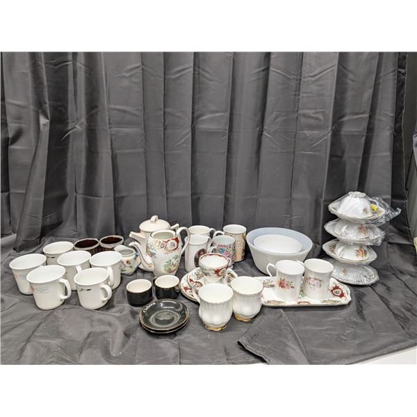 lot of tea cups, champagne glasses, tea pots, small plates, and etc.