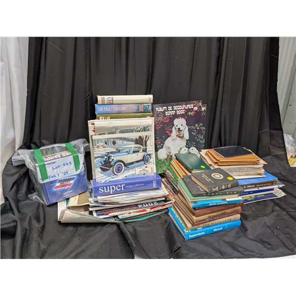 lot of car calendars, john deer calendars, instruction manuals and books, first aid books, police bo