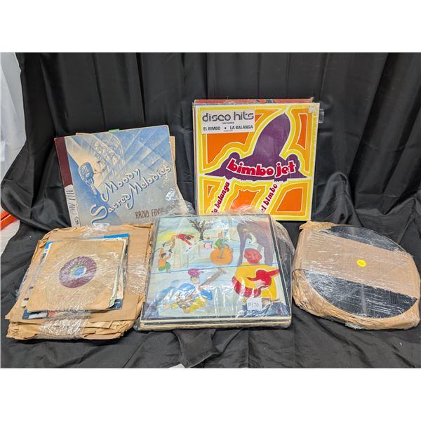 lot of records (Disco hits, moody sacred melodies, and etc.)