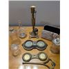 Image 1 : Brass Candle Stick and Snuffer, two Brass stands for oil and vinegar decanters, three votive holders