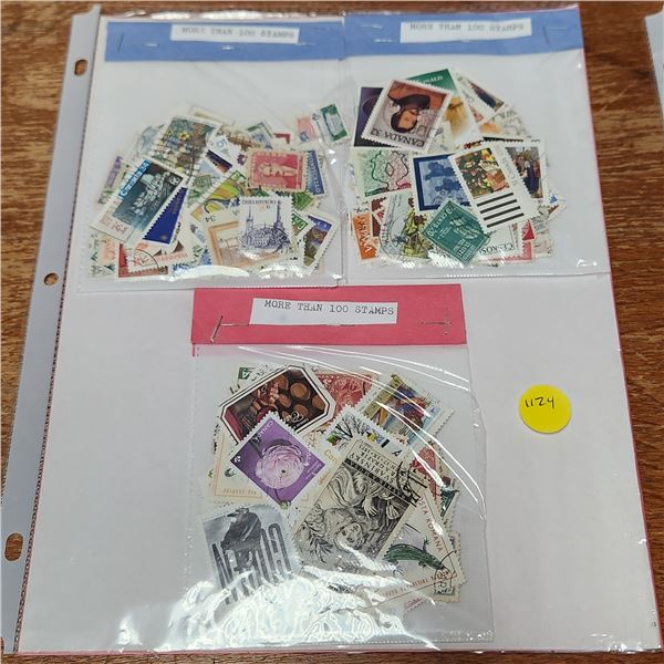 Binder Page Lot With over 300 Stamps, a Brain Teaser, One "Million Dollar Bill" With A celebrity Fac