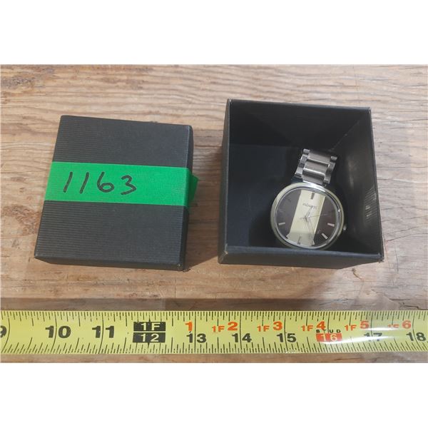 Nixon the Capital Power to the people brown and Beige men's analog watch. (Working)