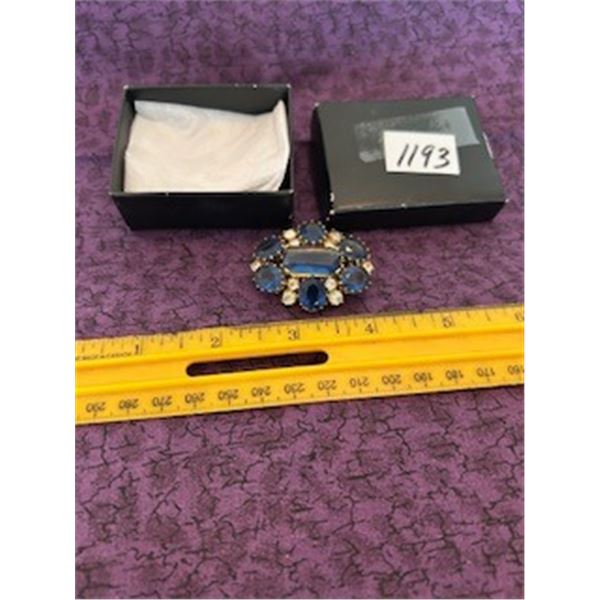 Blue stone brooch