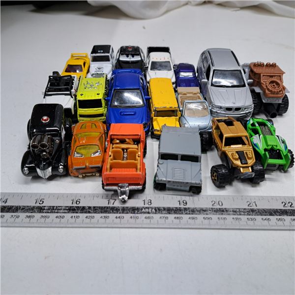 Various plastic toy cars some are hotwheels