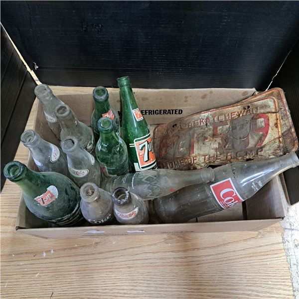Various soda glass bottles, pepsi, coke and 7up and 2 damaged licence plates
