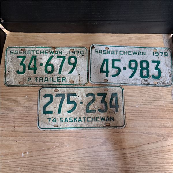 3 licence plates-sask