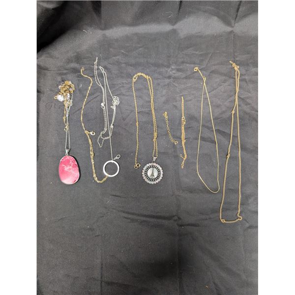 (6) Gold coloured necklaces (2) Silver coloured
