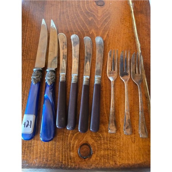 9 fancy pieces of cutlery