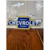 Image 1 : Die cut porcelain Chevrolet bow-tie sign 11in wide x 4in tall. Siongle sided fantasy