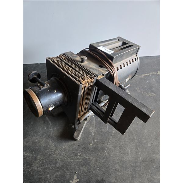 Over 100 year old glass slide projector still works perfectly