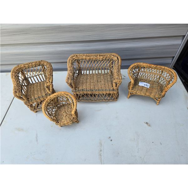 4 piece set of rattan doll furniture