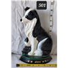 Image 1 : Cast iron, painted dog door stop.