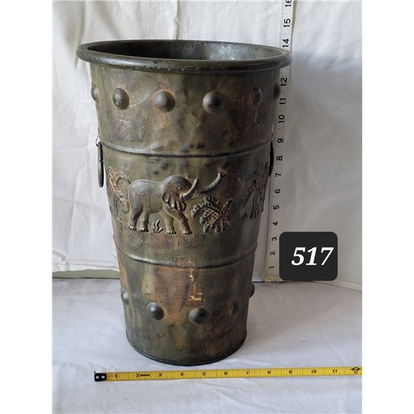 Large embossed metal elephant container.