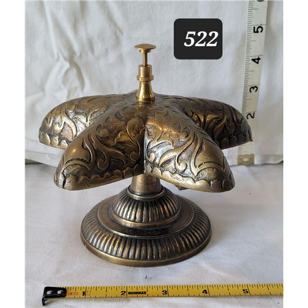 Vintage star shaped, hotel front desk service bell.