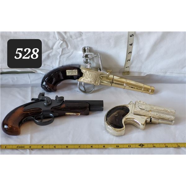 Vintage Avon pistol decanters.