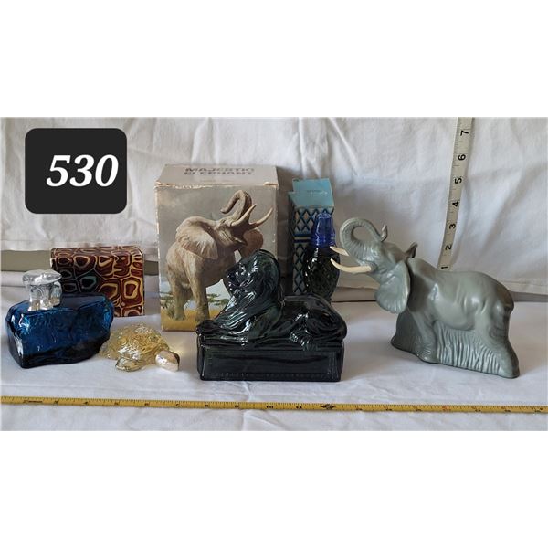 Vintage Avon exotic animal bottles.