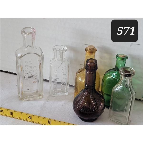 Vintage embossed bottles. WJ Fleming Prince Albert NWT, DR Bells Kingston Ont. & coloured bitters bo