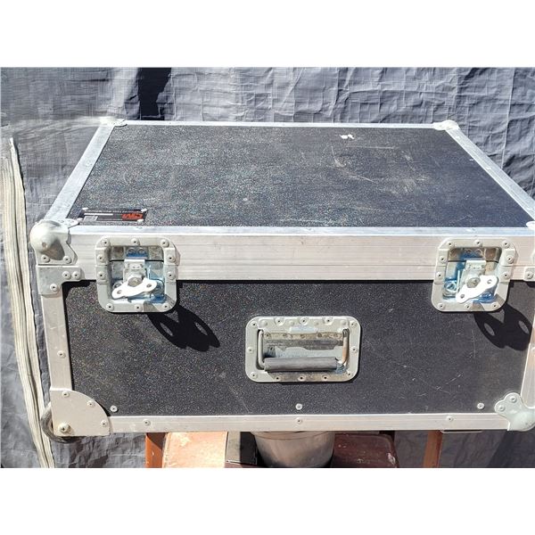 Large heavy duty, padded instrument case. Wheels for pulling & handles.Canadian made