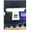 Image 1 : 1 x White Shelf; 1 x Triangle Easel Portfolio; Yard Book; 2004 Guinness World Record Book