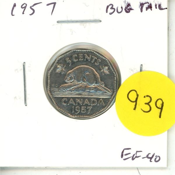 1957 Bug Tail Nickel 5 Cents. There is a small Die Chip on the end of the beaver’s tail tha