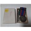 Image 1 : Canadian Voluntary Service Medal with correct ribbon. Silver. Housed in its original box. Unc.