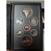 Image 1 : 1982 Double Dollar Proof Set. 7-coin set includes a Silver Dollar that commemorates the 100th Annive