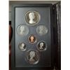 Image 2 : 1984 Double Dollar Proof Set. 7-coin set includes a Silver Dollar that commemorates the 150th Annive