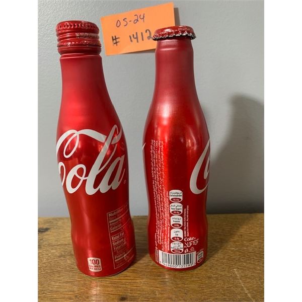 Two Aluminium Cokle Bottles.