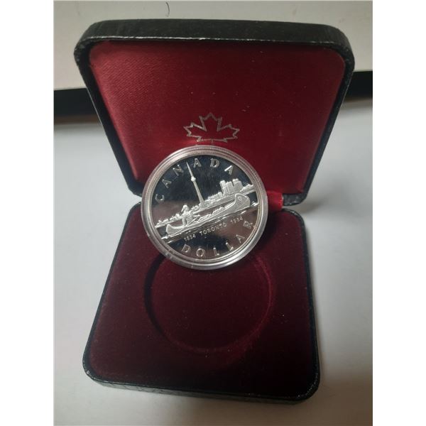 1984 Toronto Silver Dollar in Royal Canadian Mint Case.