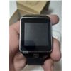 Image 2 : Smart Watch (Made in China) and Apple Earphones.