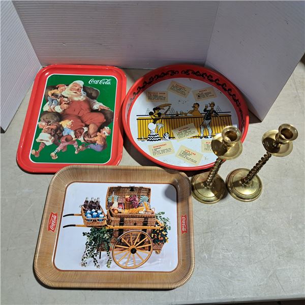 3 trays, coca cola, and 2 brass ornaments