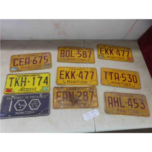 7 manitoba lisence plates 1976, 1 alberta plate. 