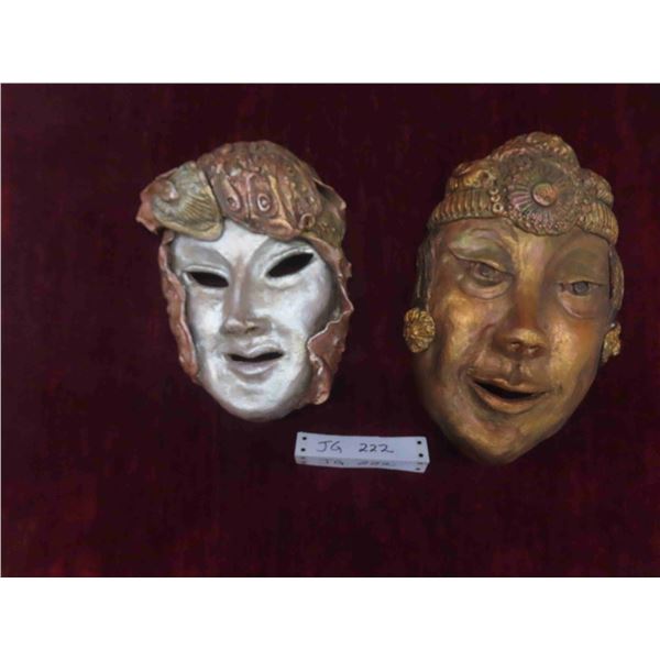 two wall sculptures done by artist jean hunter tallest 10"