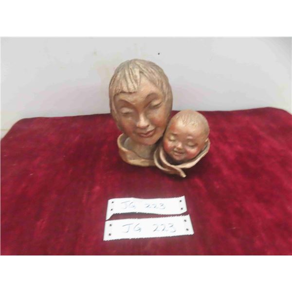 sculpture of a mother and child done by artist jean hunter 6.5" tall 