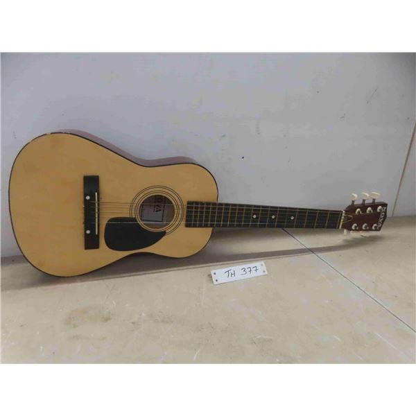 kids acoustic guitar(string missing, repair made to back of guitar) 