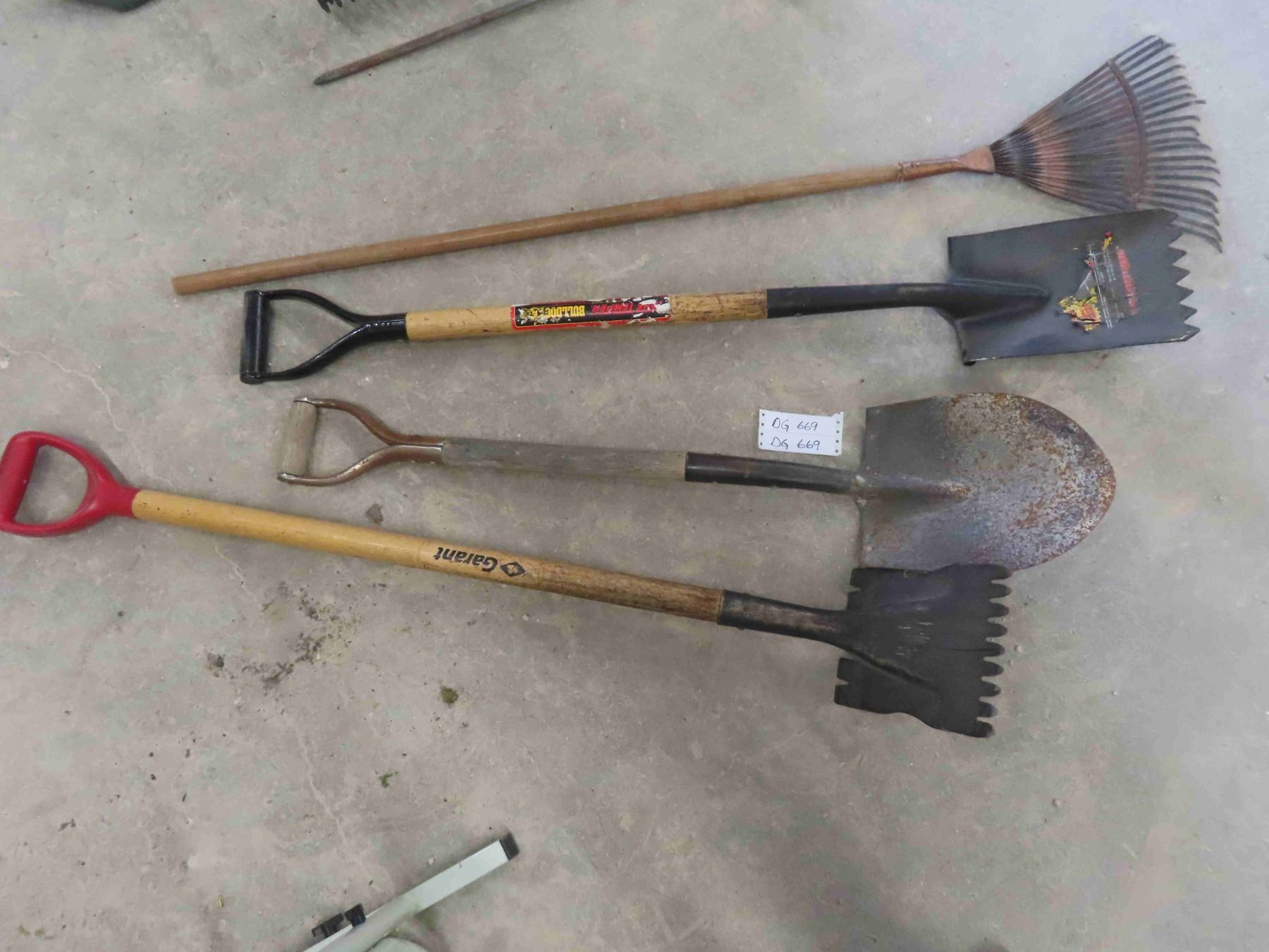 yard tools , rake and spade