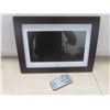 Image 2 : sylvania digital picyture frame with remote, and dvd player with remote 
