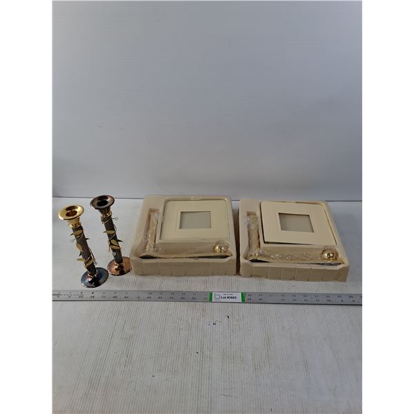 (2) Photo Holders and (2) Candle Holders.