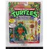 Image 1 : TEENAGE MUTANT NINJA TURTLES CARDED MICHELANGELO