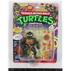 Image 1 : TEENAGE MUTANT NINJA TURTLES CARDED DONATELLO