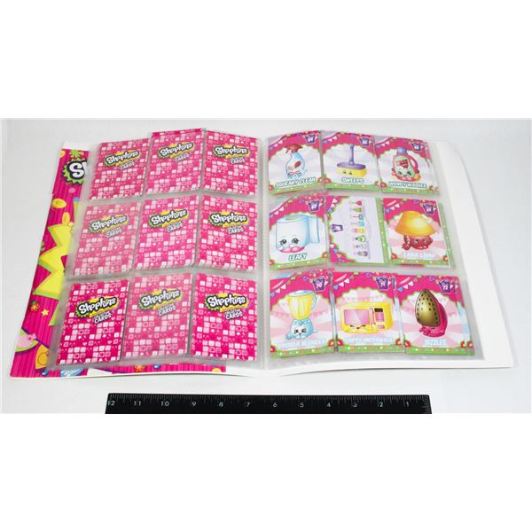 SHOPKINS COLLECTOR ALBUM WITH LOTS OF COLLECTOR