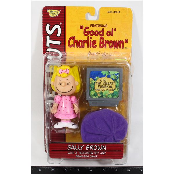 PEANUTS SALLY BROWN WITH A TELEVISION SET AND