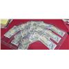 Image 1 : 32 $1 CANADIAN BILLS FROM 1973 ONE BILL IS TAPED TOGETHER - SOME UNCIRCULATED