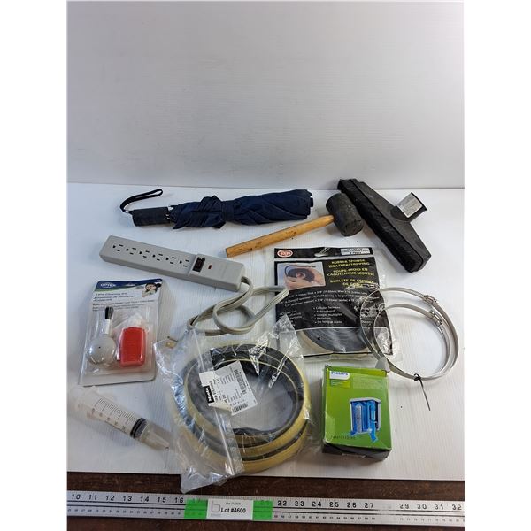Power Bar, Umbrella, Rubber Sponge Weatherstripping, Hammer, Lens Cleaning Kit and Misc