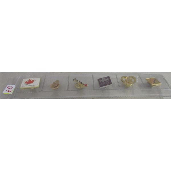 ROW OF SIX COLLECTABLE PINS